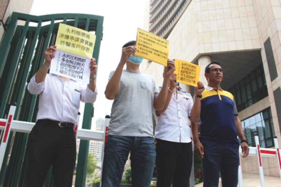 Dore depositors protest outside Wynn Macau again