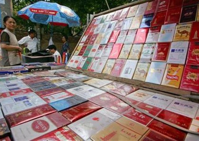 Macau government cuts duty-free cigarette allowance by half to 100