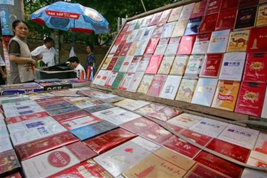 Macau government cuts duty-free cigarette allowance by half to 100