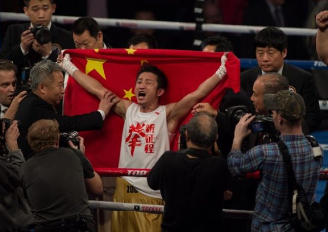 Former Olympic champ Zou wins decision on pro boxing debut