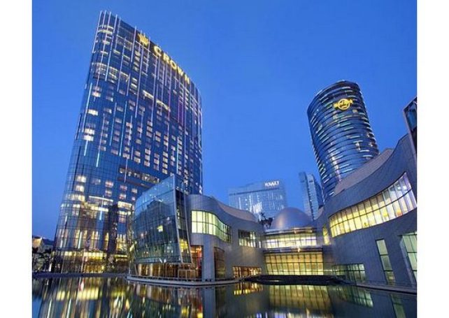 Melco Crown net revenue falls 7 pct in Q2