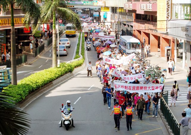 Hundreds protest in Macau against columbaria in residential buildings