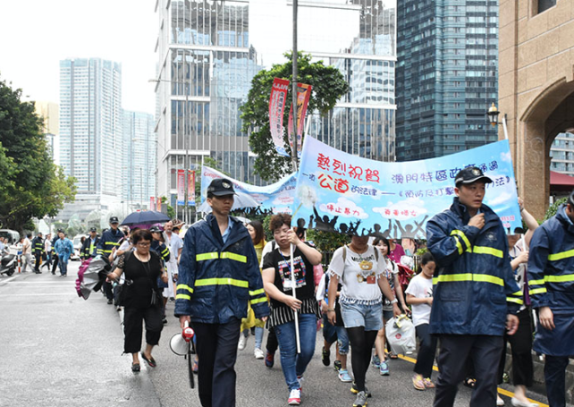 About 70 march in Macau to celebrate domestic violence law