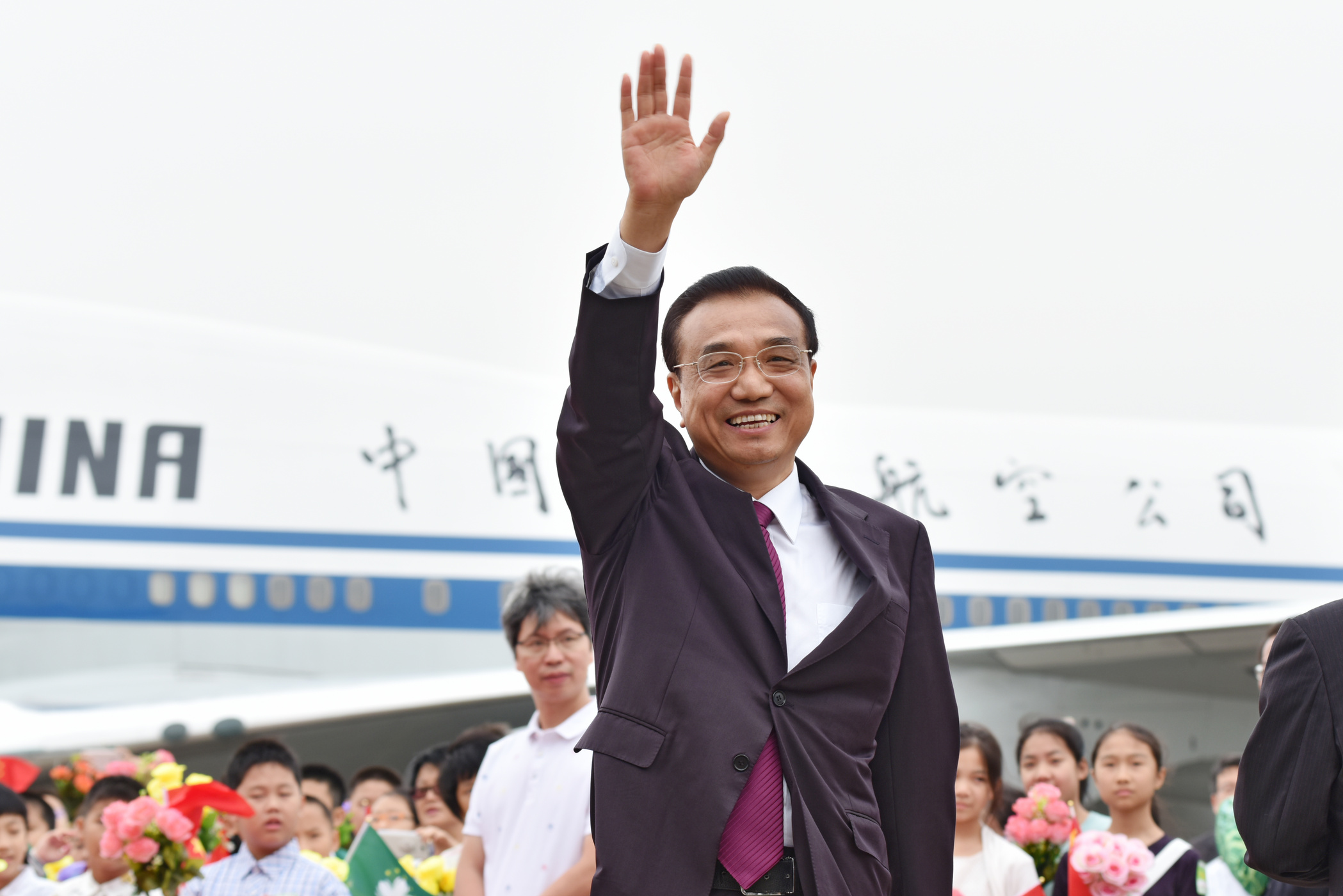 Li pushes for diversification in Macau and vows to return