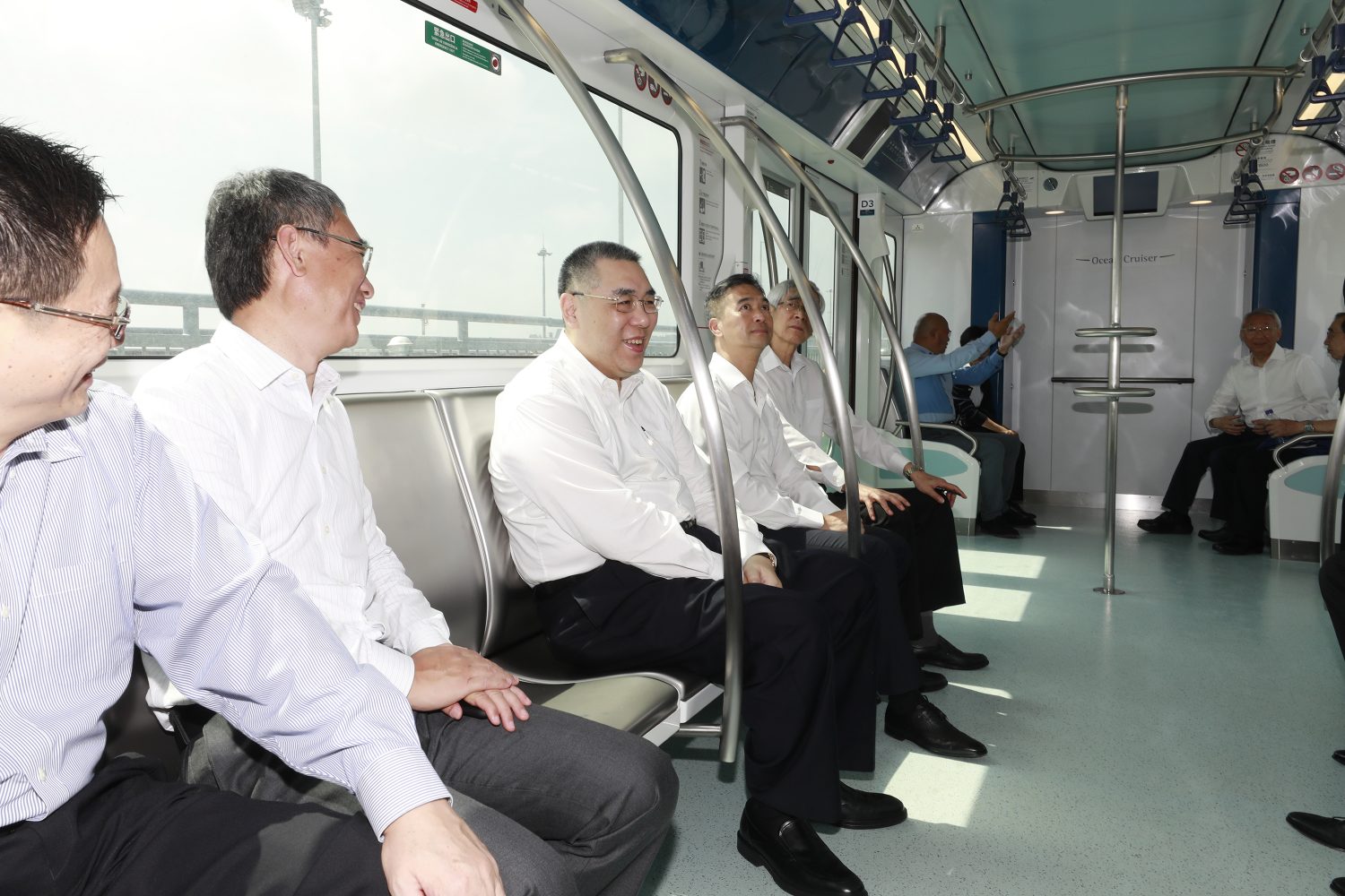 Chui Sai On and senior officials take their first LRT ride