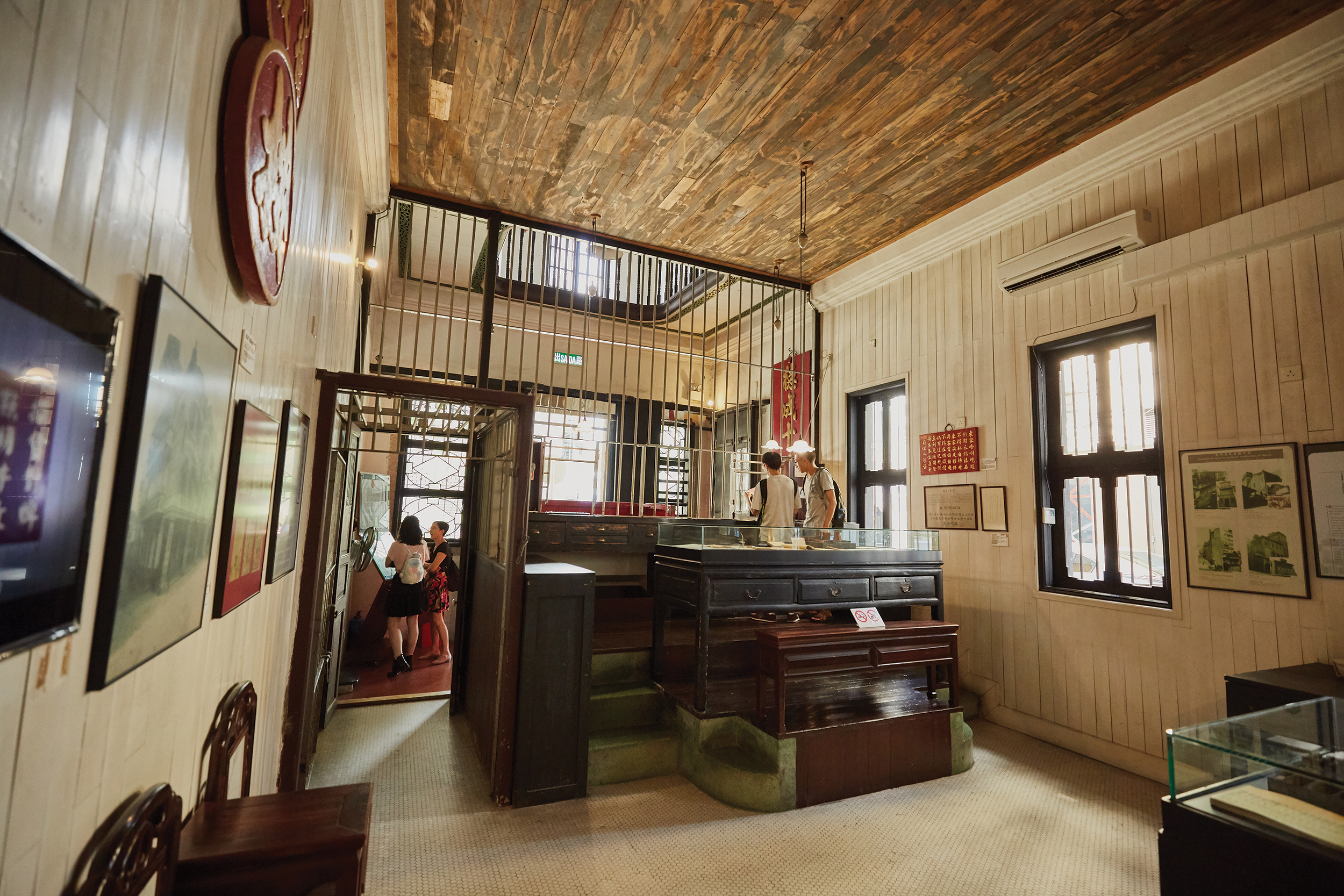 The interior of the Heritage Exhibition of a Traditional Pawnshop Business where the tools of the trade are displayed within glass cases - Photo by António Sanmarful