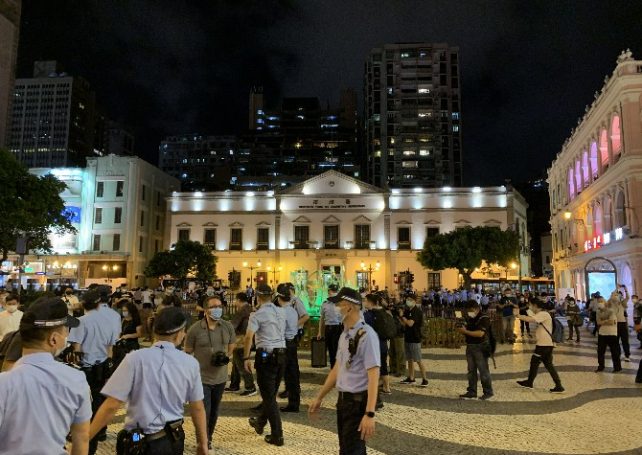 Police officers patrol the city’s main square