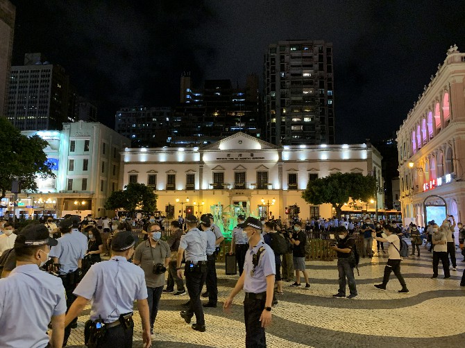 Police officers patrol the city’s main square