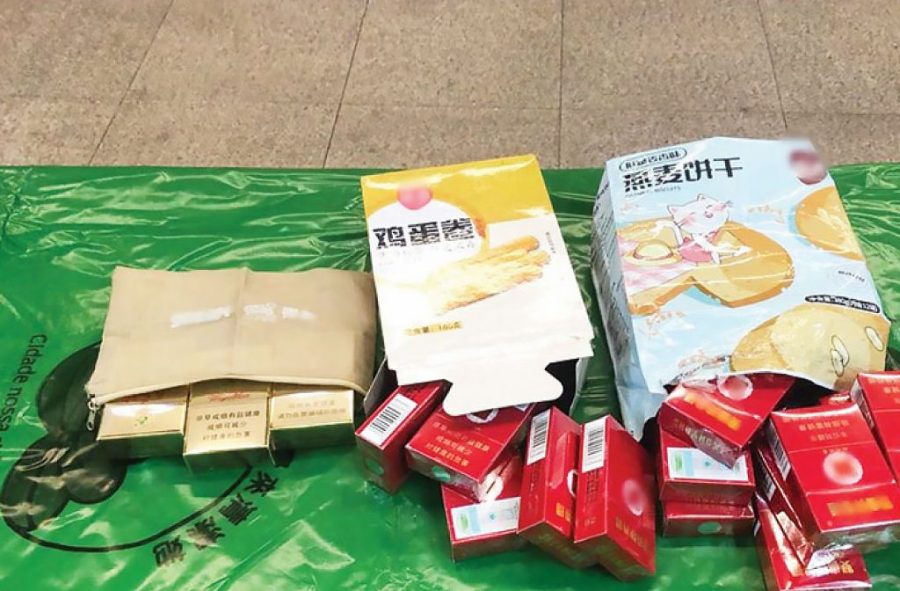 2 locals nabbed for smuggling cigs from mainland