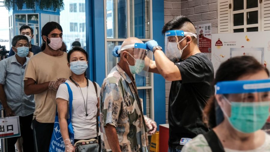 Hong Kong to ease social distancing from Friday