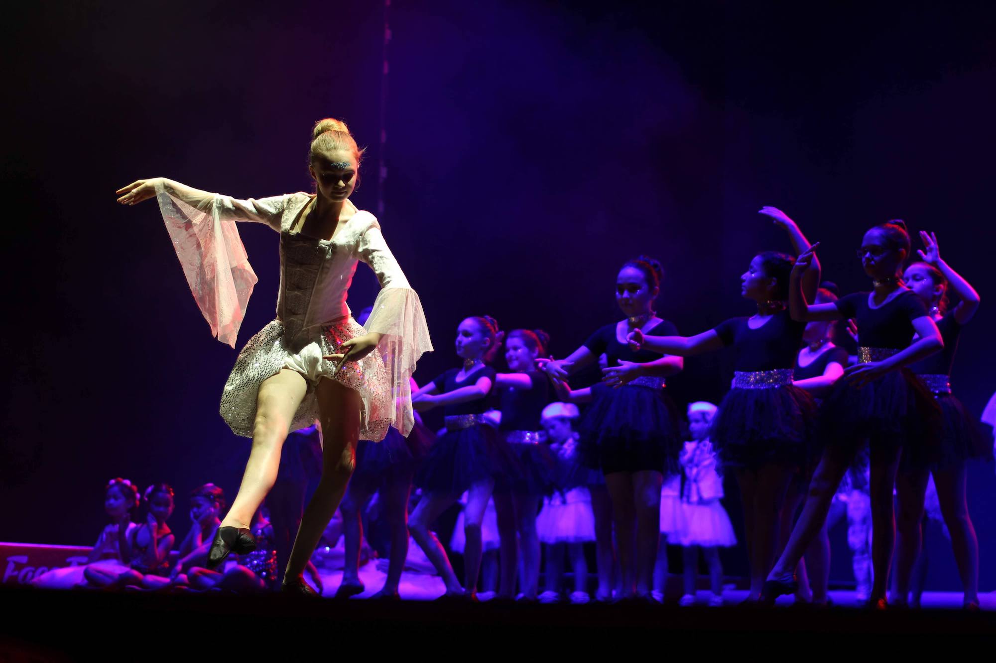 A dancer performs in front of the cast at the club’s ‘Made in Macau- Rock Thru the Ages’ show in June 2018 at The Parisian Macao Theatre - Photo Courtesy of Macau Glee Club