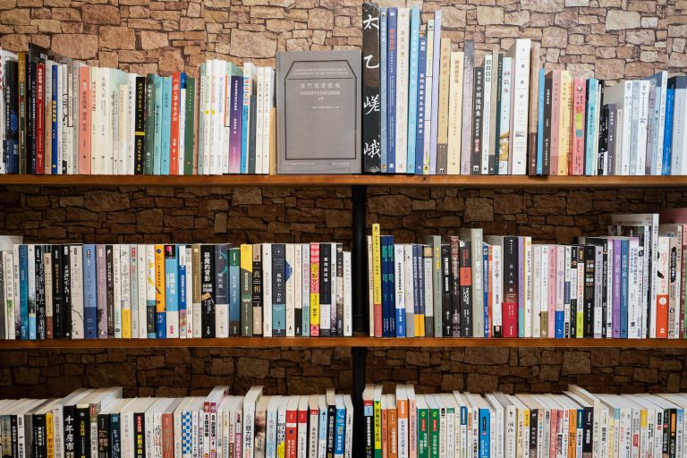 Filled bookshelves inside Slow Tune Book Shop | Photo by Denzel Calangi
