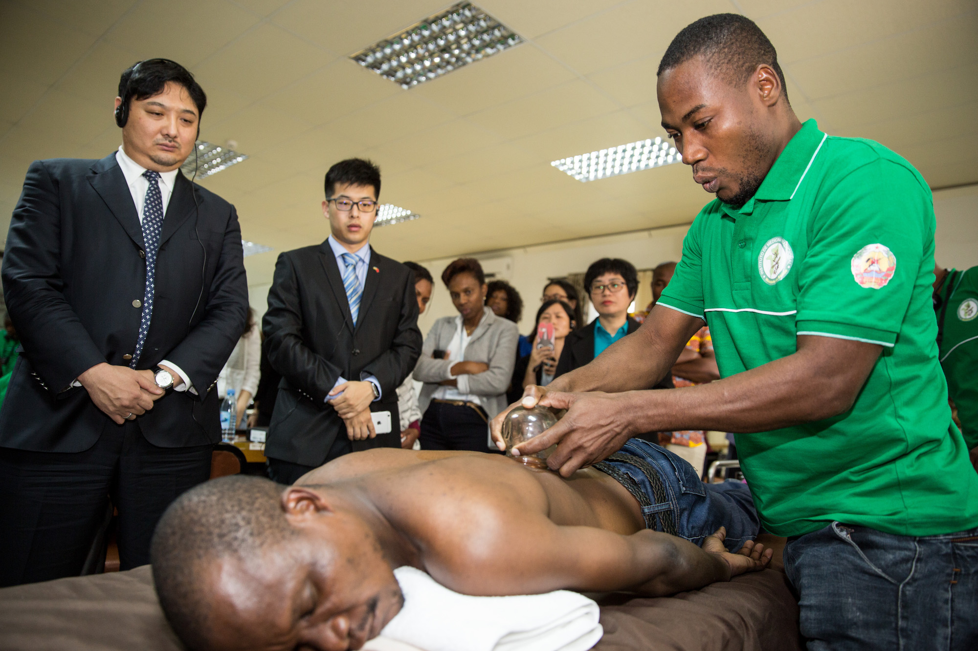 Mozambique student learning cupping during a TCM training course