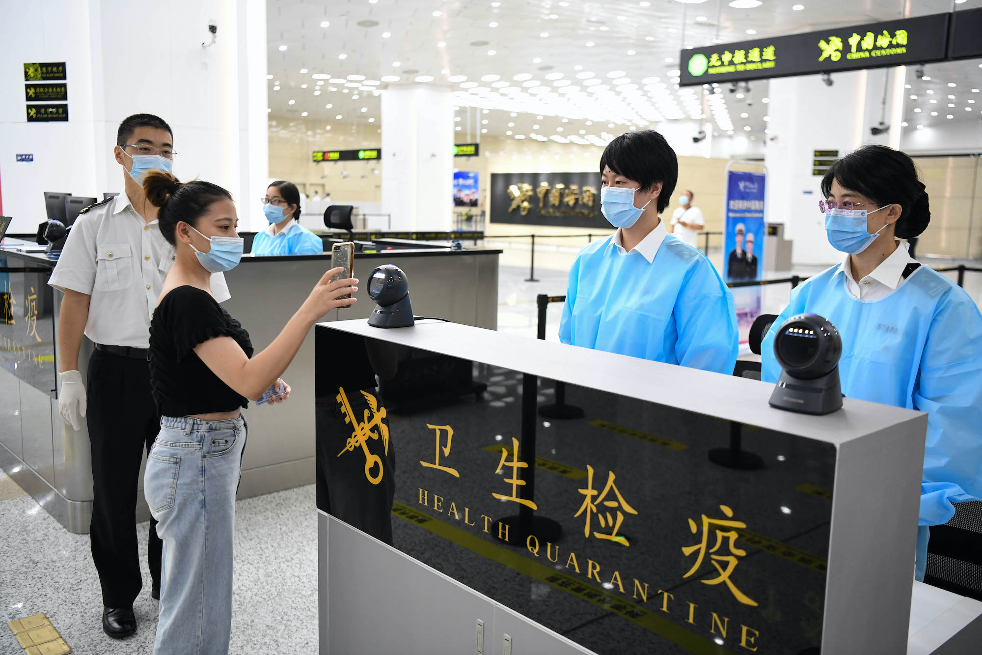 Quarantine to enter mainland China lifted; negative 24-hour NAT result required