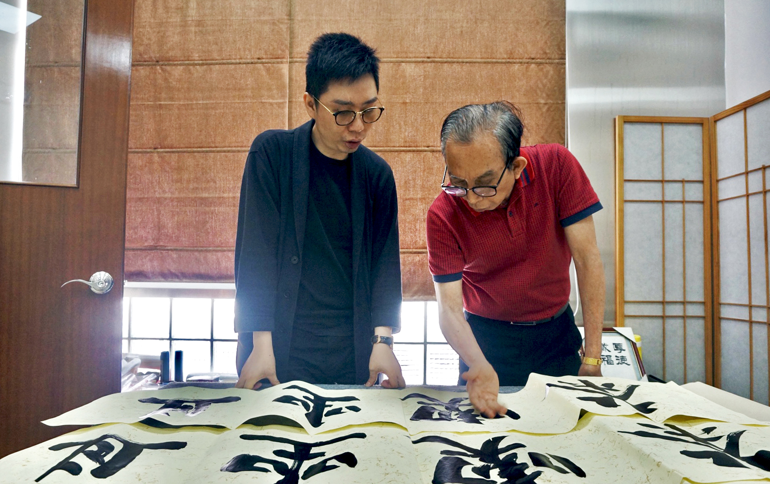 Father and son calligraphers - Mok Wa Kei and Elvis Mok Hei Sai