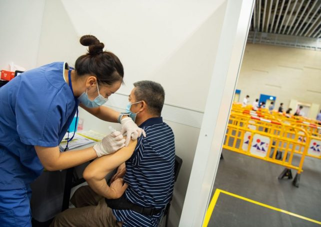 Health chief urges public to get vaccinated as mainland virus outbreak spreads