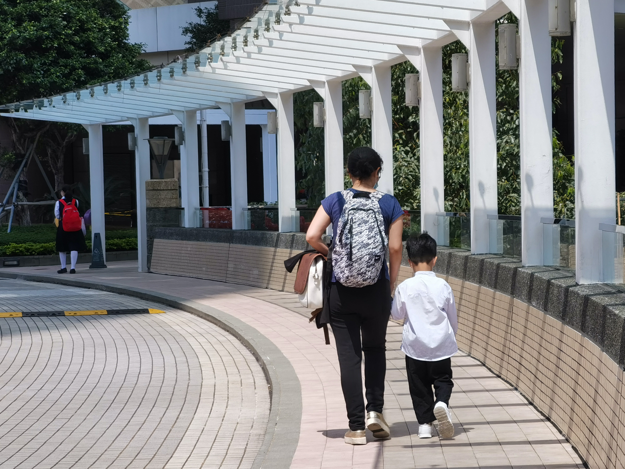 Foreign domestic helpers barred from Macao until elderly and kids’ jab rates hit 90%