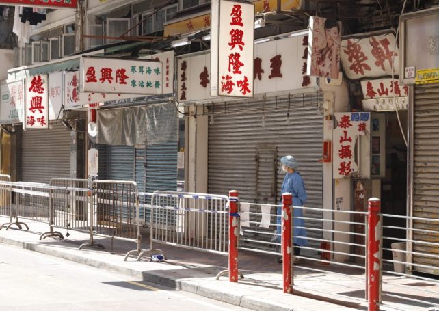 Hong Kong government urged to put city on lockdown to curb Omicron variant