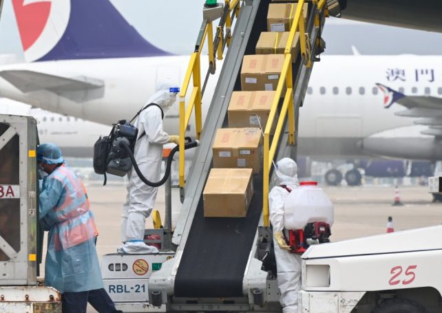 Airport staff give arriving cargo rigorous disinfection to foil novel coronavirus