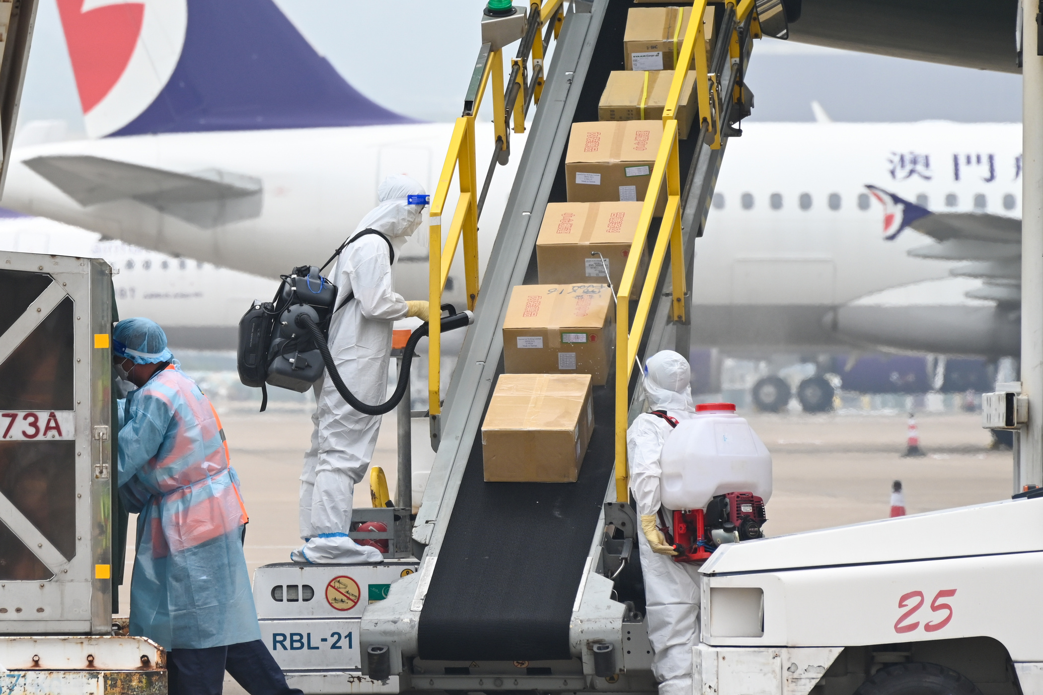 Airport staff give arriving cargo rigorous disinfection to foil novel coronavirus