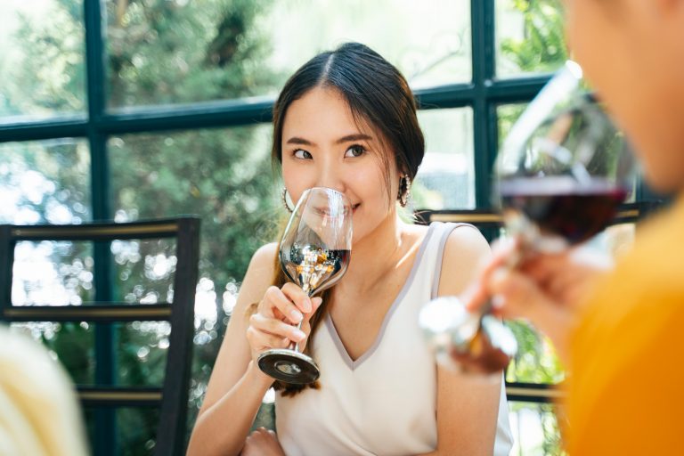 Woman smelling wine_Macao News