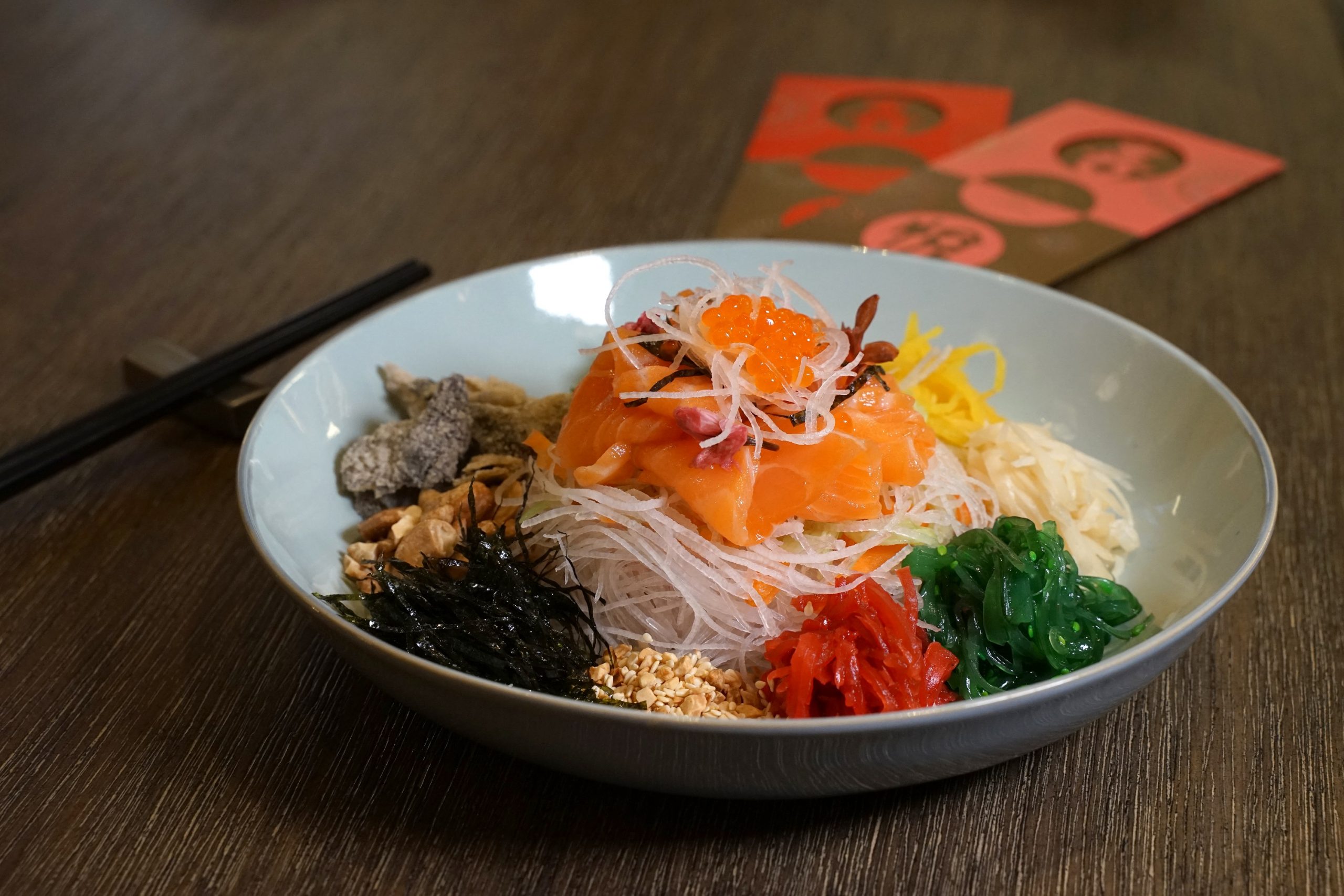 The Conservatory - CNY set 2023_'lo hei' with salmon sashimi