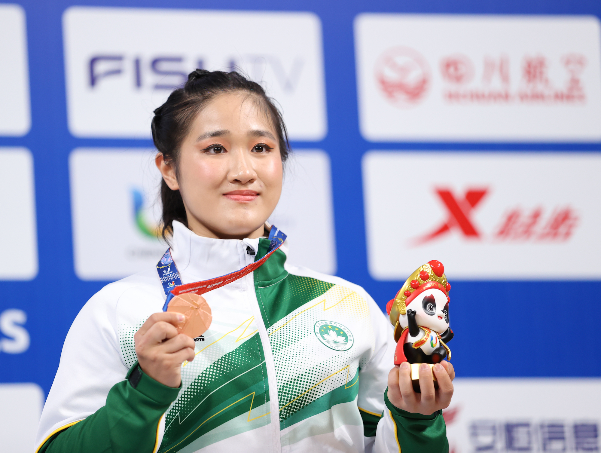 Wong posing with her bronze medal in the women’s ‘nanquan’ category at the 2023 FISU World University Games in Chengdu