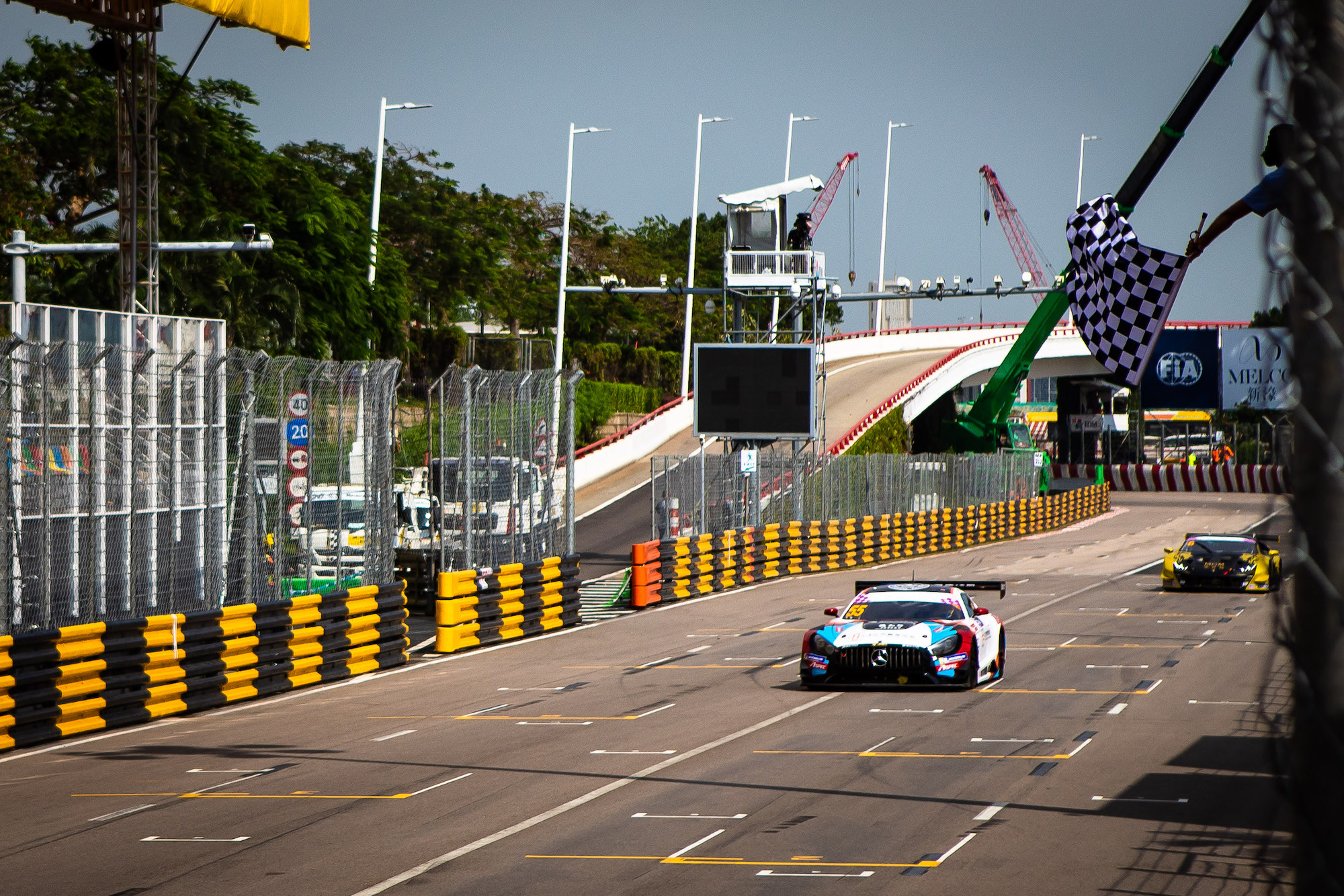 Darryl O’Young gets the chequered flag as Ling Kang comes in second