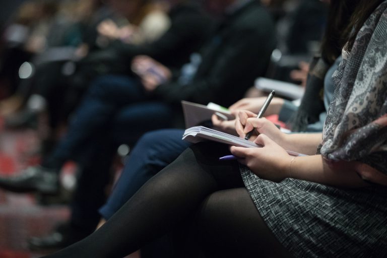 MICE, woman attending event