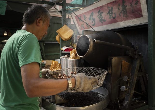 Nuts about tradition: António Chao is one of the faces of winter in Macao