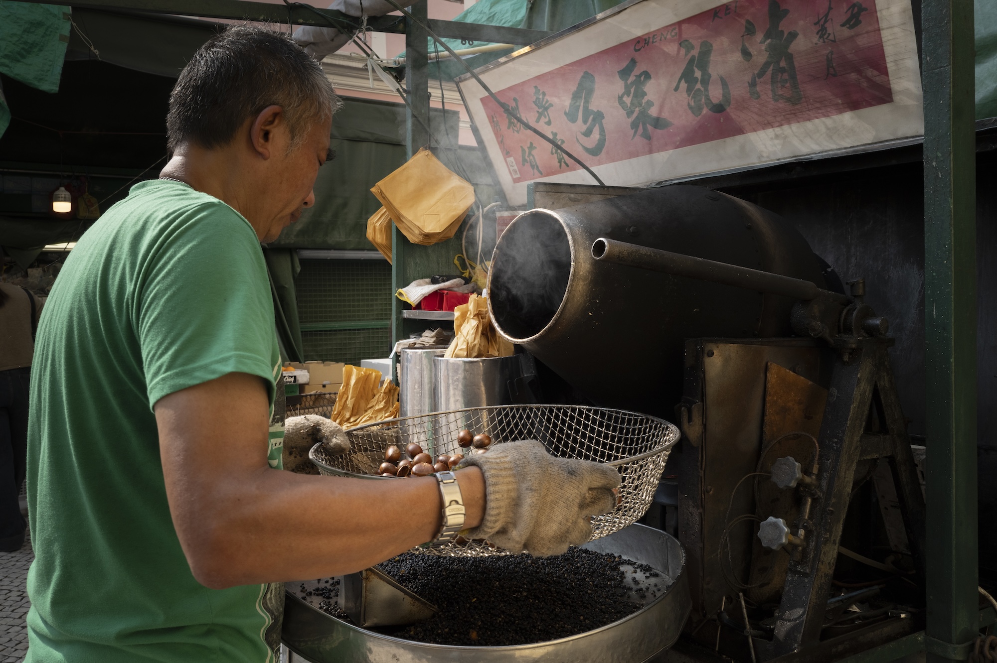 Nuts about tradition: António Chao is one of the faces of winter in Macao