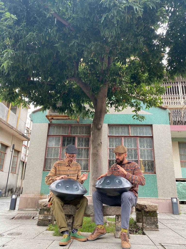 Handpan duo Wan (left) and Variz (right) created the song “Under the Tree” at this exact spot near the Na Tcha Temple