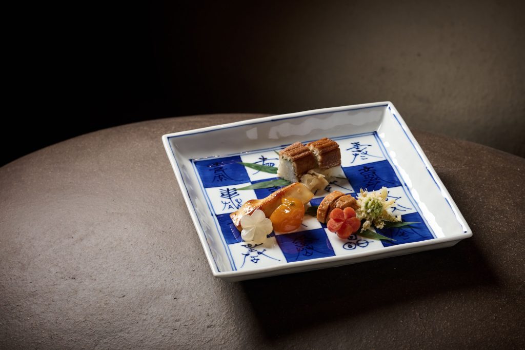 The hassun, an appetiser platter of small seasonal dishes, featured delightful creations: sea eel sushi; grilled pomfret; steamed monkfish liver and butterbur tempura