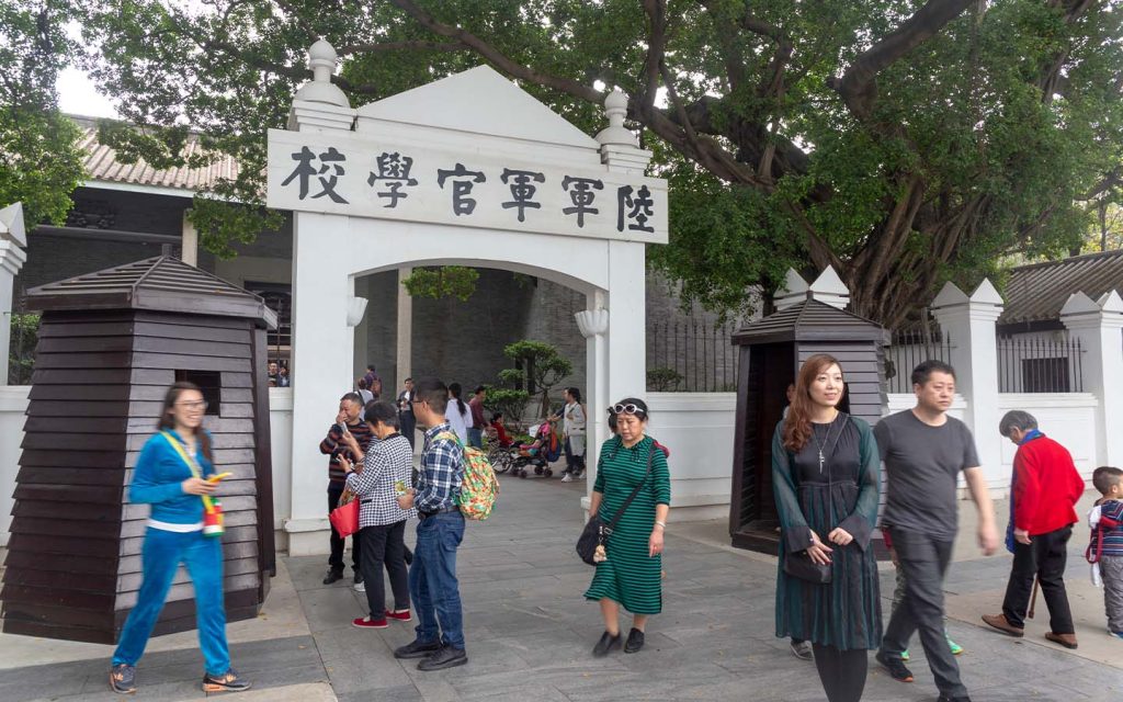 Tourists seen at the gate of the former Huangpu Military Academy, Guangzhou, on 5 February 2019