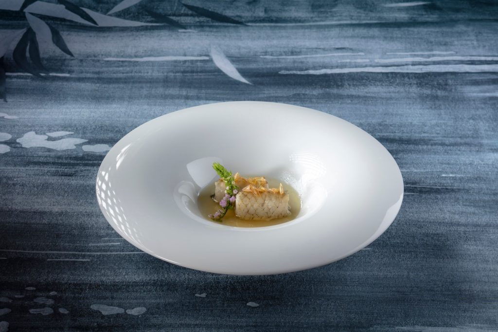 Infused with passion and precision, the signature hilsa herring fish with 20-year-old Huadiao wine showcases the essence of Huaiyang cuisine