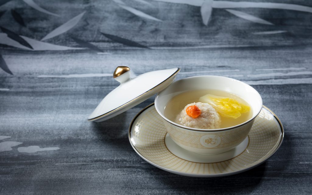 Zhou’s stewed pork ball with crab roe in superior soup often surprises diners with its tender texture and clear broth