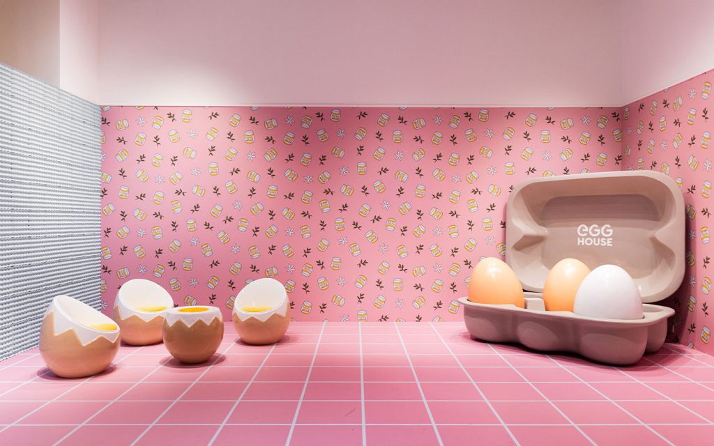 A supersized egg party awaits in the kitchen, where a giant egg carton makes for a perfect Instagram moment