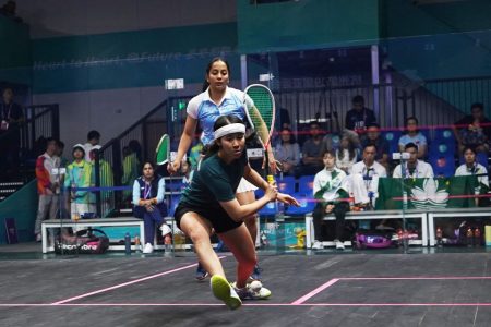 Macao's top squash player Gigi Yeung competing for Macao's squash team against team India