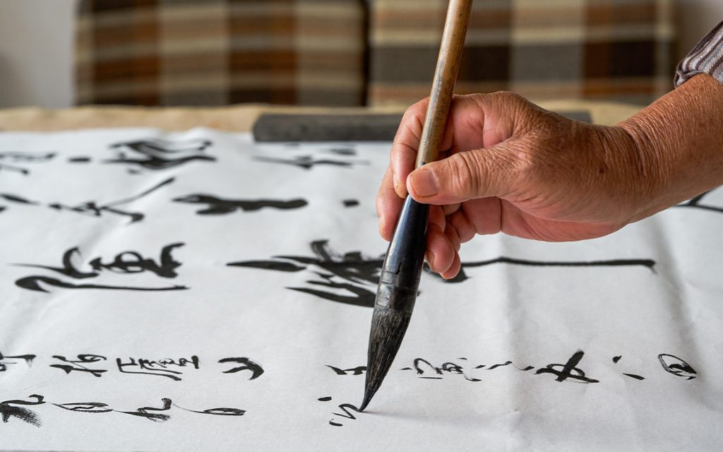 Chinese calligraphers always write in traditional forms and consider simplified characters inappropriate