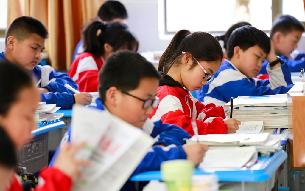 Students in Macao may need to learn and use simplified characters, at least some of the time, from the point of view of national assimilation, experts say