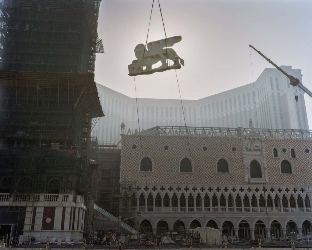 An ornamental lion is swung into place during the construction of the Venetian, 8 May 2007