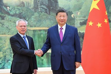 President Xi Jinping (right) meets with Sam Hou Fai (left), who was newly elected as Macao's chief executive, during a meeting at the Great Hall of the People in Beijing - Photo by Xinhua News Agency/Xie Huanchi