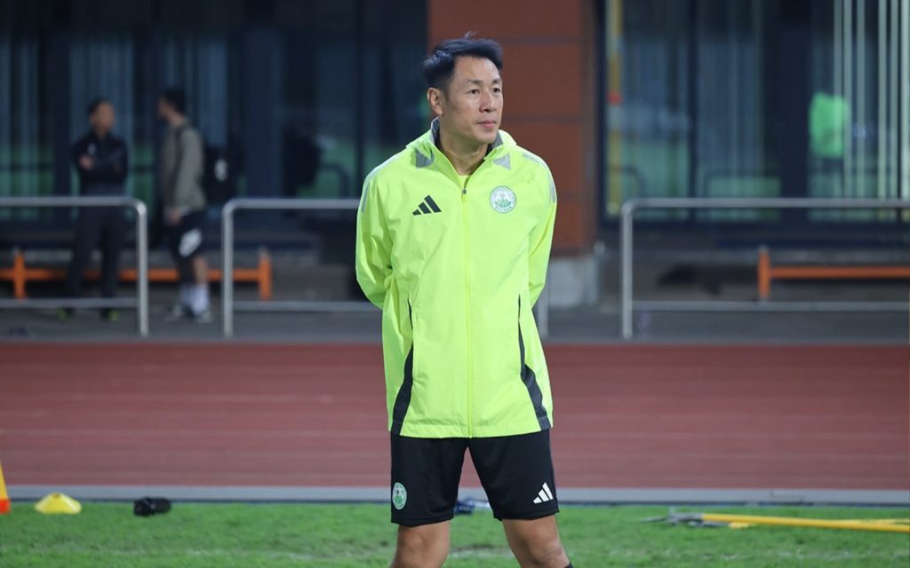 Kwok watches his Macao team train as they prepare for the EAFF qualifiers in Hong Kong tomorrow