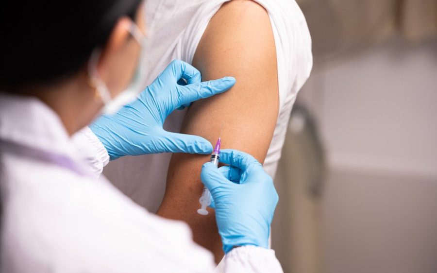 Health officials urge vaccinations as flu season reaches its peak