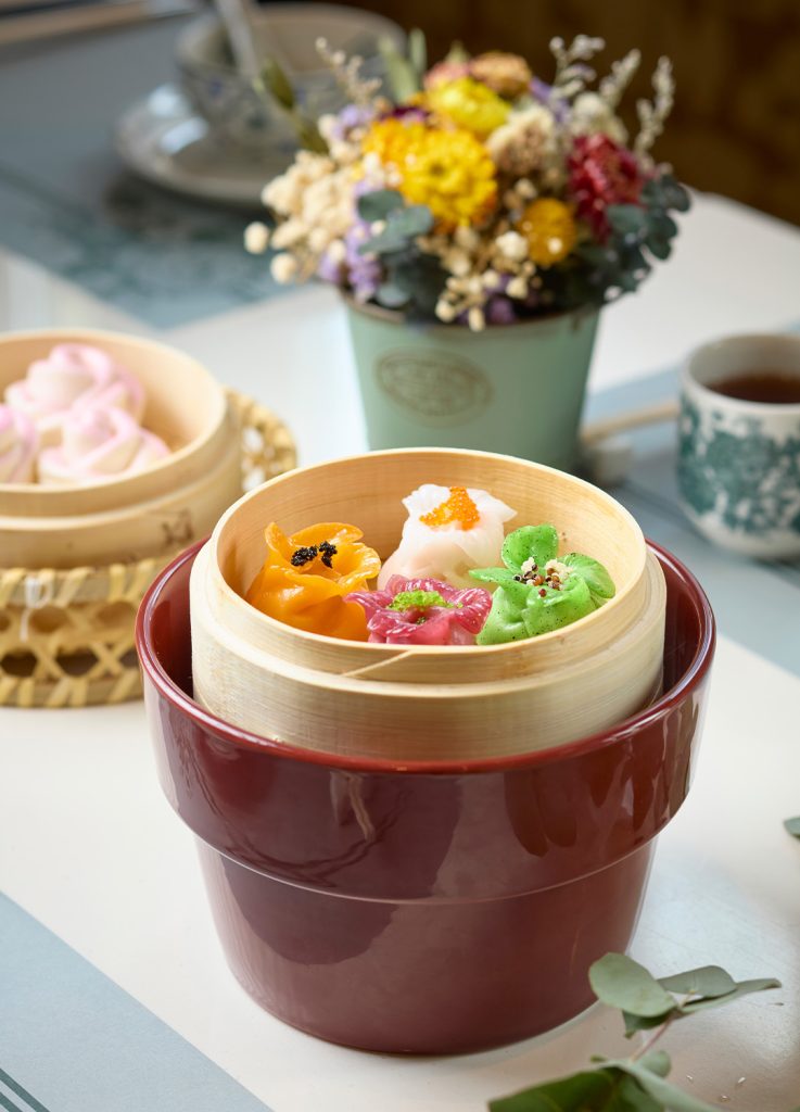 Don’t miss the “Flower Sisters” – four types of steamed shrimp dumplings in one picture-perfect steamer basket
