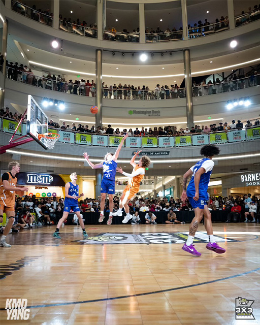 Neumann seen taking flight during a 3x3 basketball game