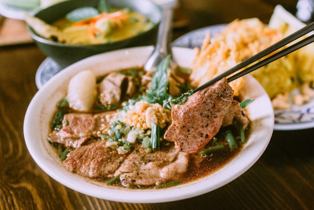 Voyage Thai Kitchen’s chefs simmer the broth for their Angus beef boat noodles for four hours each morning
