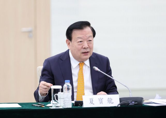 Xia Baolong appeals to Macao businesses to persevere amid economic headwinds