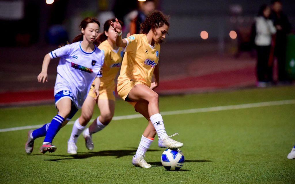 Matos showcasing her skills around defenders in Hong Kong’s second division