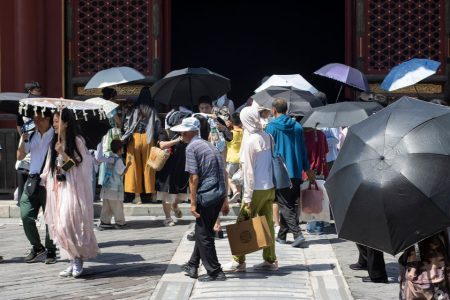 China struggles with heatwaves in the north and flooding in the south